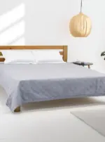 vitamin_vv_89862_a_bright_natural_bedroom_interior_with_soft__c205aa20-e4b9-490b-a5fd-b6f6783f7add_0