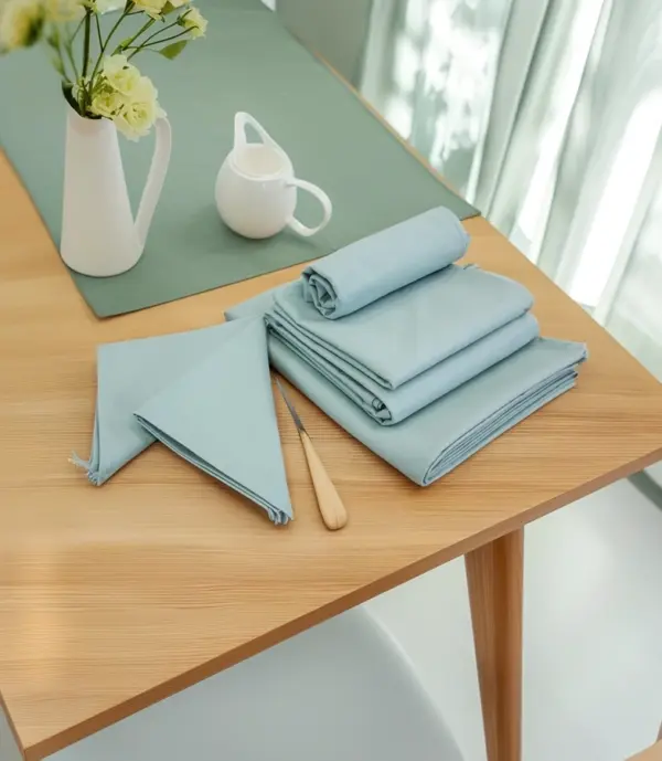 vitamin_vv_89862_A_wooden_table_with_a_tablecloth_in_the_inte_fa363784-ff8e-4d85-b883-780fbe39106b_0